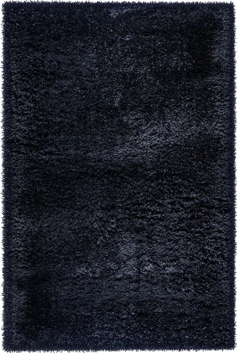 Woven Bliss – Midnight Tundra rug with a deep, solid black with a plush, shaggy texture, giving it a luxurious and soft feel