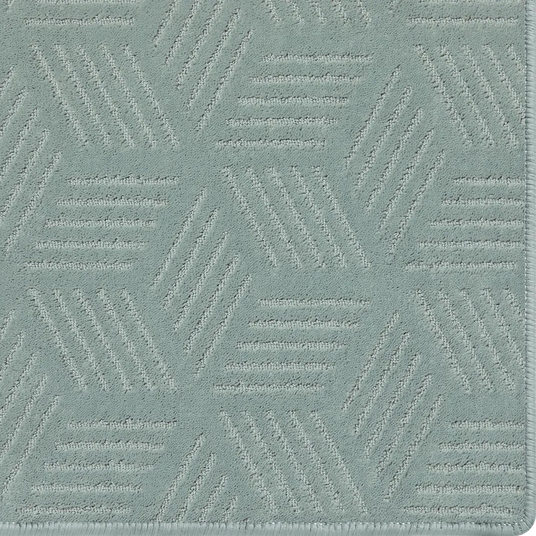 Woven Bliss – light blue rug with cube pattern and overlocked edges