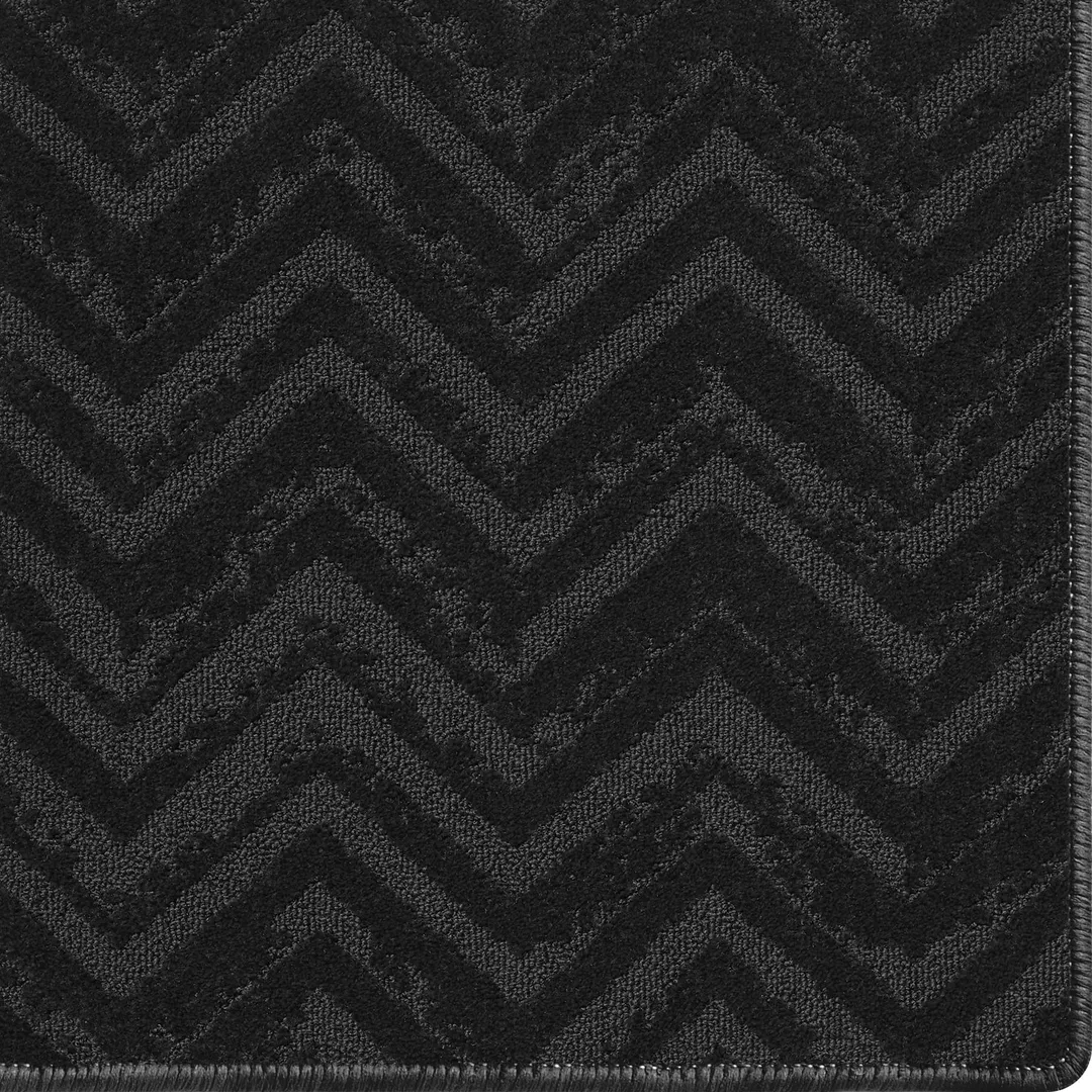 Woven Bliss – charcoal carpet rug with relic pattern and overlocked edges