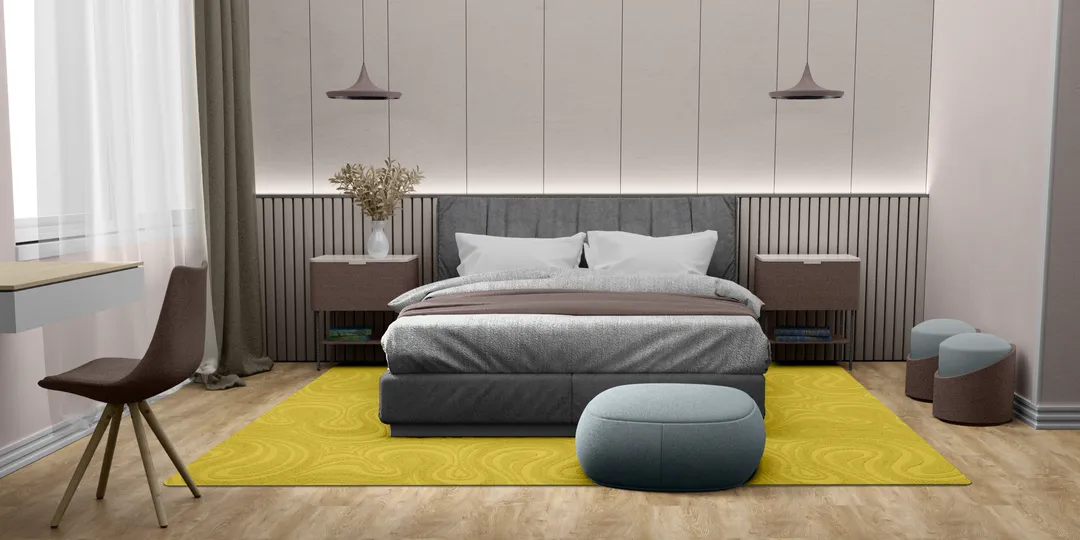 Woven Bliss – Mustard yellow custom size rug with swirl pattern and overlocked edges in bedroom