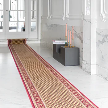 Woven Bliss – Red Sahara Scroll Runner down white hallway