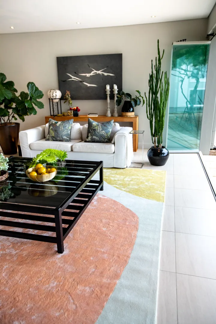 coffee table and couch on marriage rug