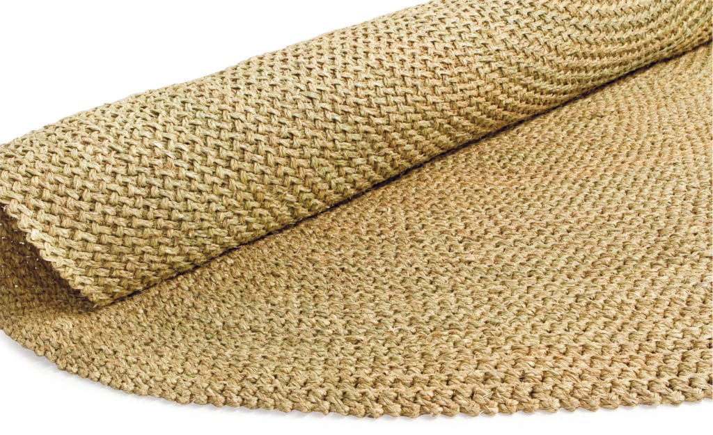 Elevate your home with the Round Crochet Luthindzi Rug, a masterpiece of sustainable artistry handwoven from 100% natural Luthindzi grass. Crafted by skilled artisans in Eswatini, this circular rug brings organic elegance to any space. Available in three sizes (2m, 2.5m, and 3m), its versatile design complements diverse interior styles from bohemian to minimalist. Each unique piece celebrates traditional weaving techniques while empowering local female artisans through fair trade practices. The lightweight, durable rug features an intricate crochet weave that adds warmth and texture to living rooms, dining areas, bedrooms, and covered patios. Beyond its aesthetic appeal, this rug represents a commitment to sustainable living, cultural preservation, and ethical craftsmanship. Easy to maintain and naturally breathable, it's more than a floor covering—it's a statement of beauty and social responsibility.