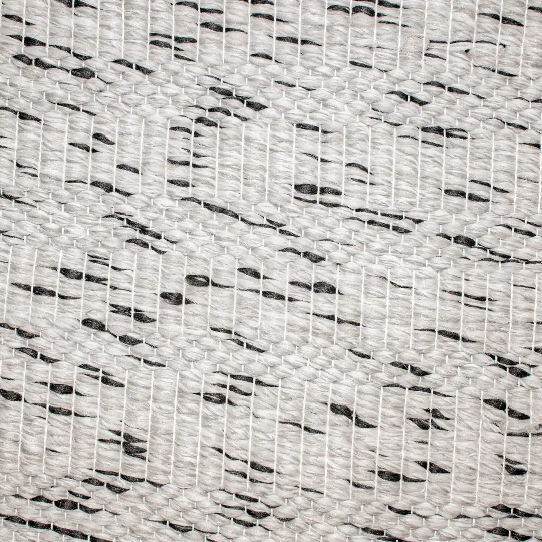 Woven Bliss – grey polypropylene with charcoal speckled pattern mat